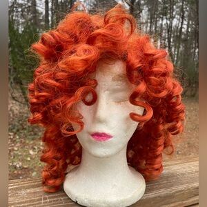 Vibrant Orange Curly Wig….. Synthetic